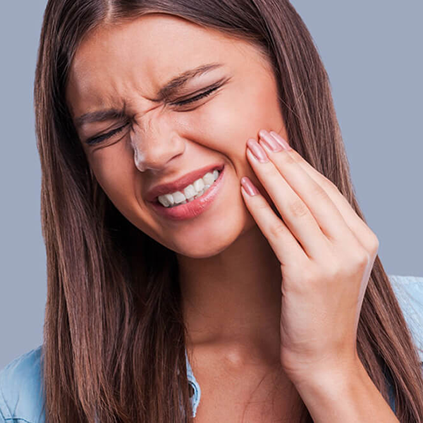 Woman clenching jaw